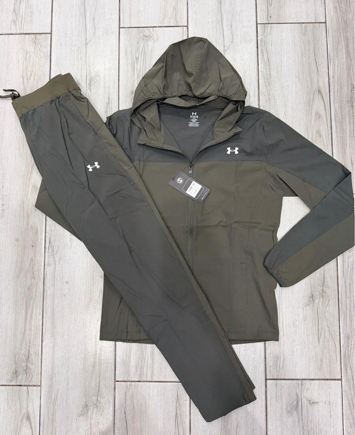 Under tracksuit