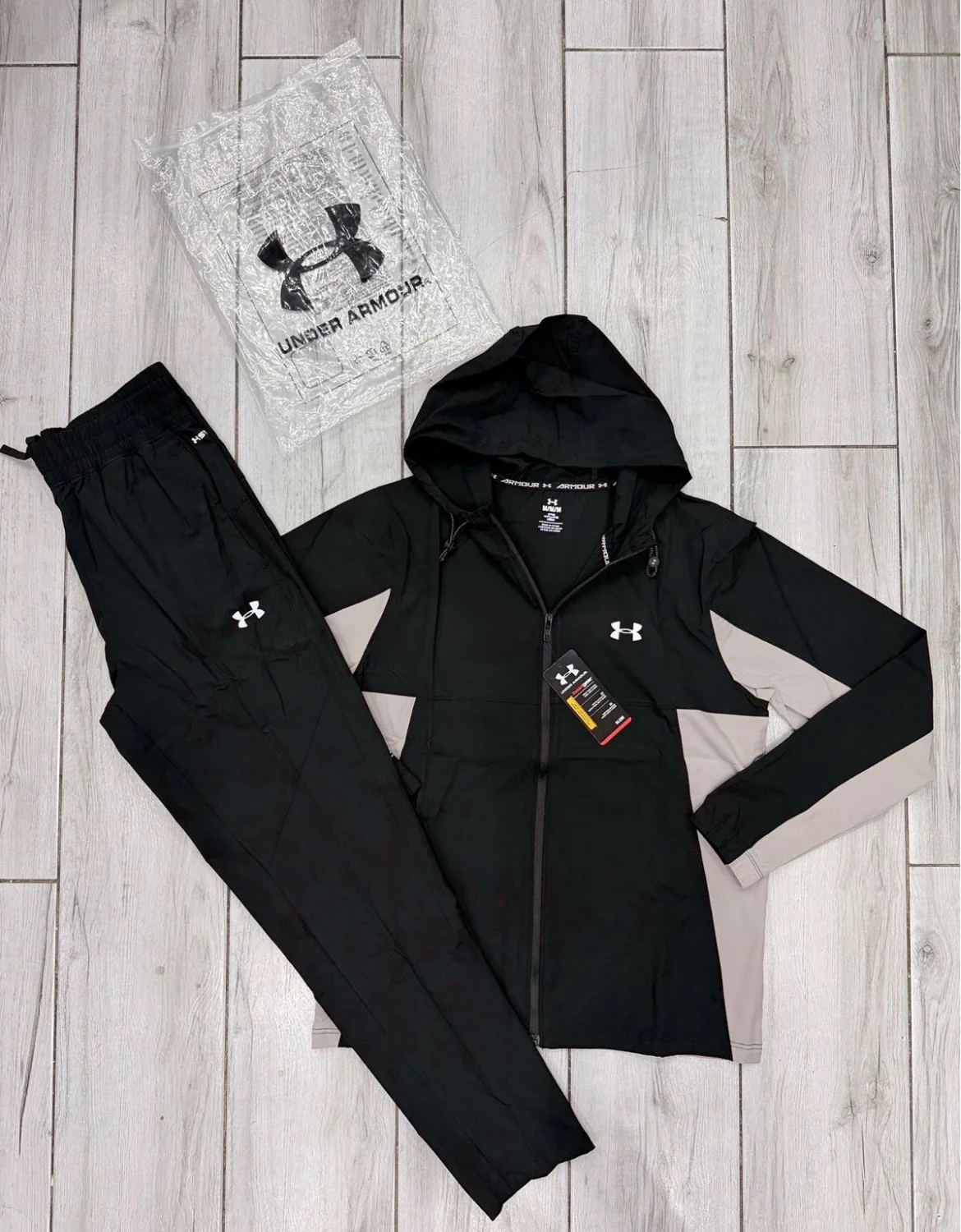 Under tracksuit